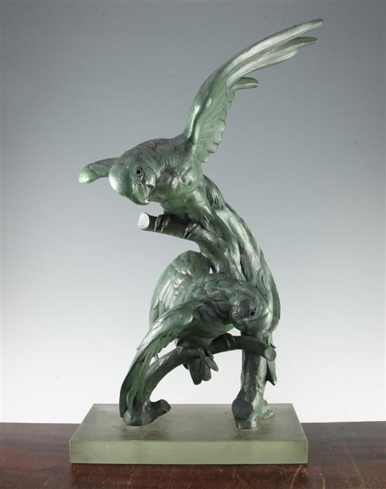 R. Pollin (French, 20th century). A green patinated bronze study of a parrot and cockatoo, 25.5in.